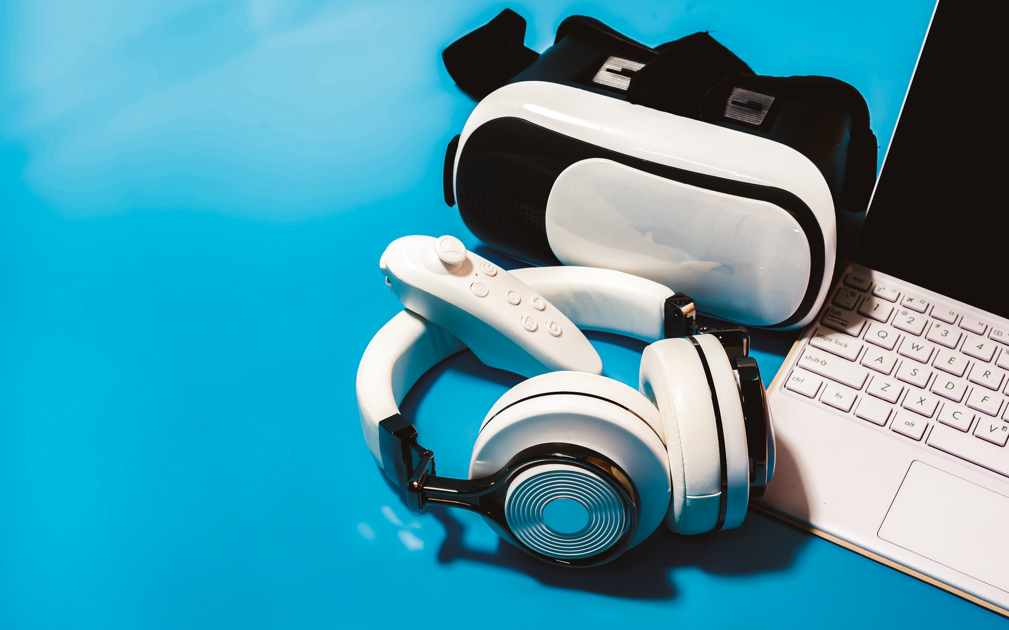 VR googles, a headset, joystick, and laptop